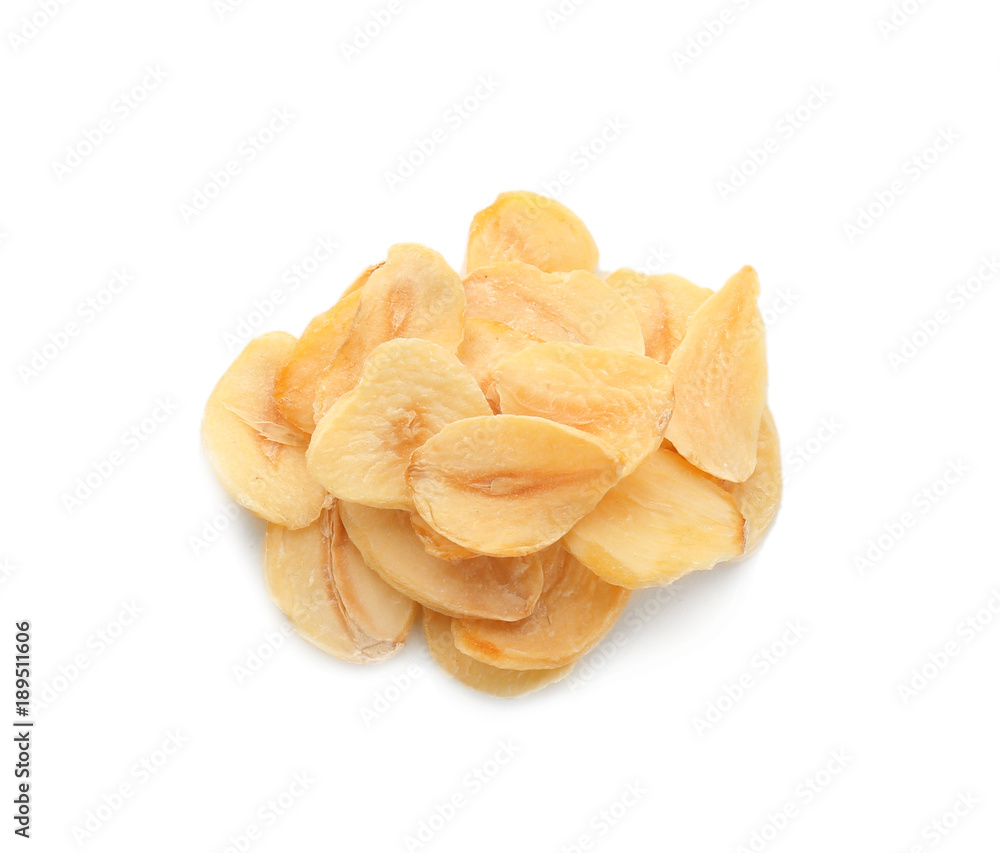 Dried garlic flakes on white background Dried garlic flakes on white background
