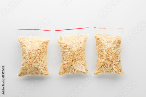 Clear plastic bags with granulated dried garlic