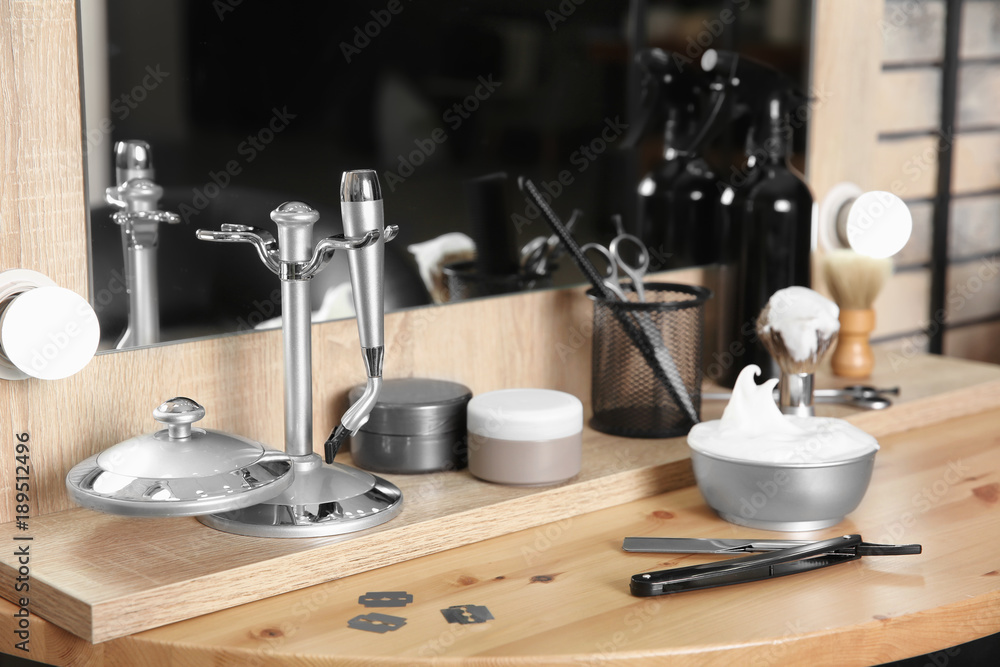 Professional hairdresser set for men on table in salon Professional hairdresser set for men on table in salon