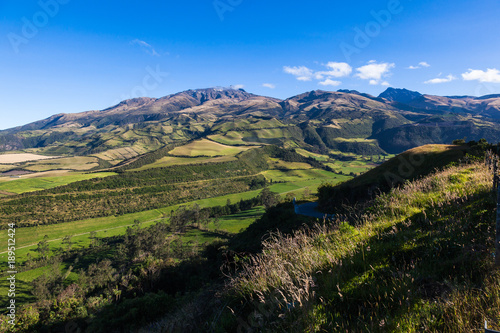 Pichincha Mountains with their slopes populated with crops