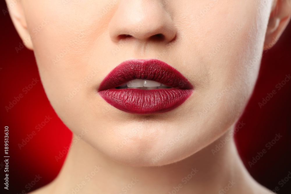 Obraz premium Woman with beautiful makeup on dark background. Professional visage artist work