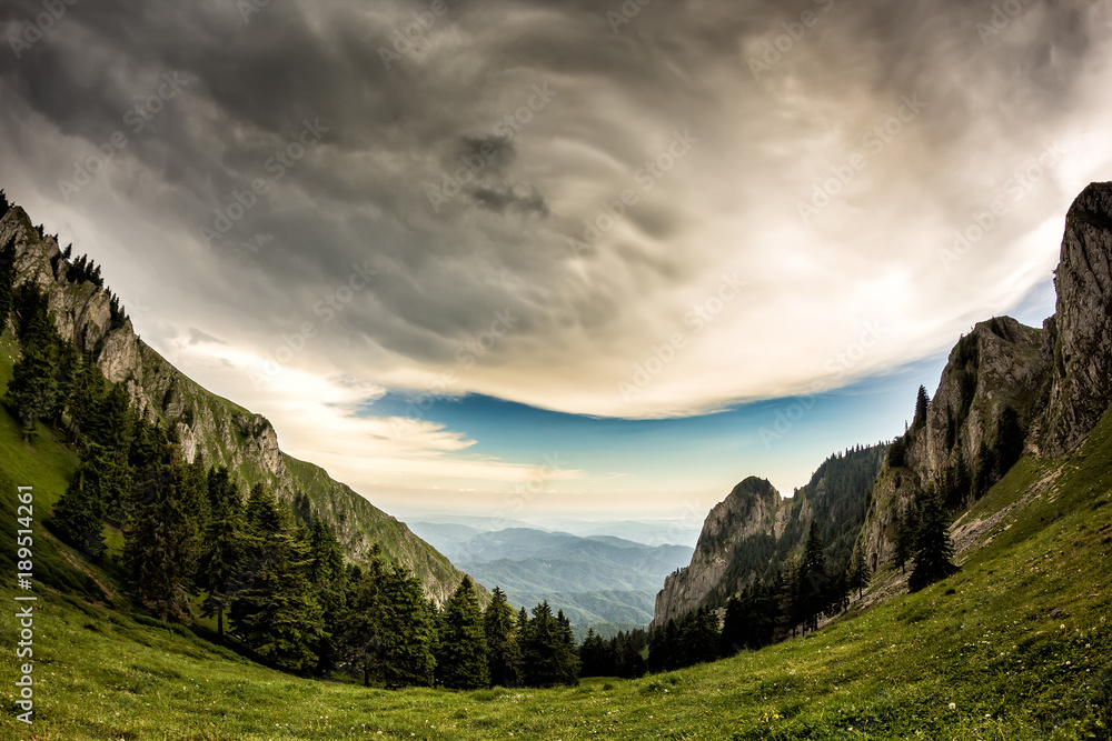 Beautiful mountain landscape with green trees and white clouds, Buila Vanturarita, Romania Beautiful mountain landscape with green trees and white clouds, Buila Vanturarita, Romania