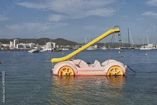 Pedal boats with slide in Cala Pinet beach photo