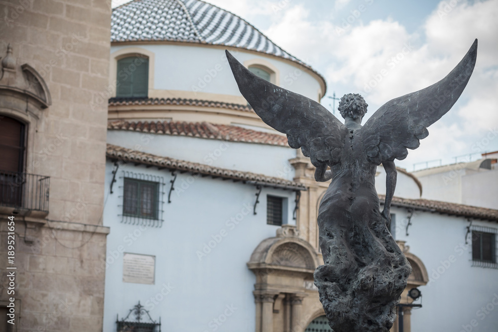 Sculpture of winged angel in front church,Satn Agustin square,Murcia,Spain.