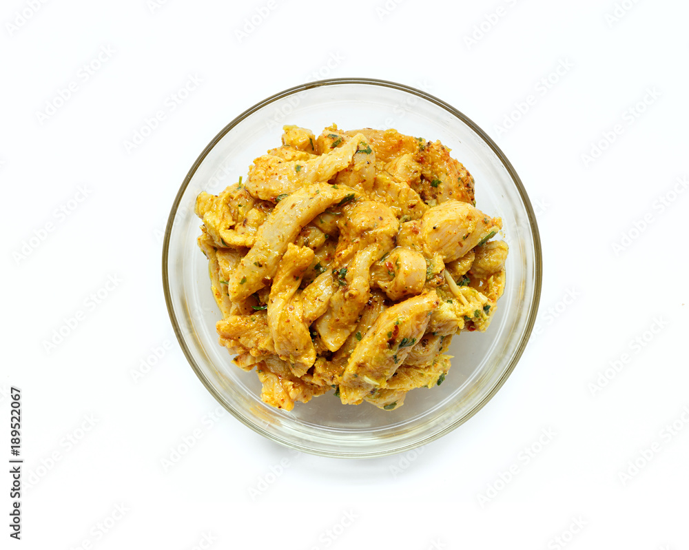 Indian chicken curry ready to cook. Marinated Chicken in chili, turmeric and different spices, isolated on white background. Indian chicken curry ready to cook. Marinated Chicken in chili, turmeric and different spices, isolated on white background.