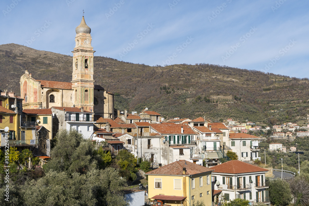 Panorama of the small town of Boscomare (Liguria, Italy), surrounded by olive trees cultivation. Typical Italian country village overlooking the Mediterranean sea, Ligurian Riviera.
