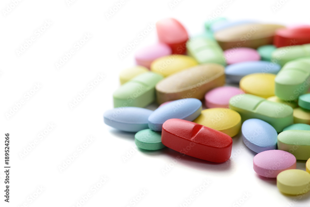 Pharmacy theme. Multicolored Isolated Pills and Capsules