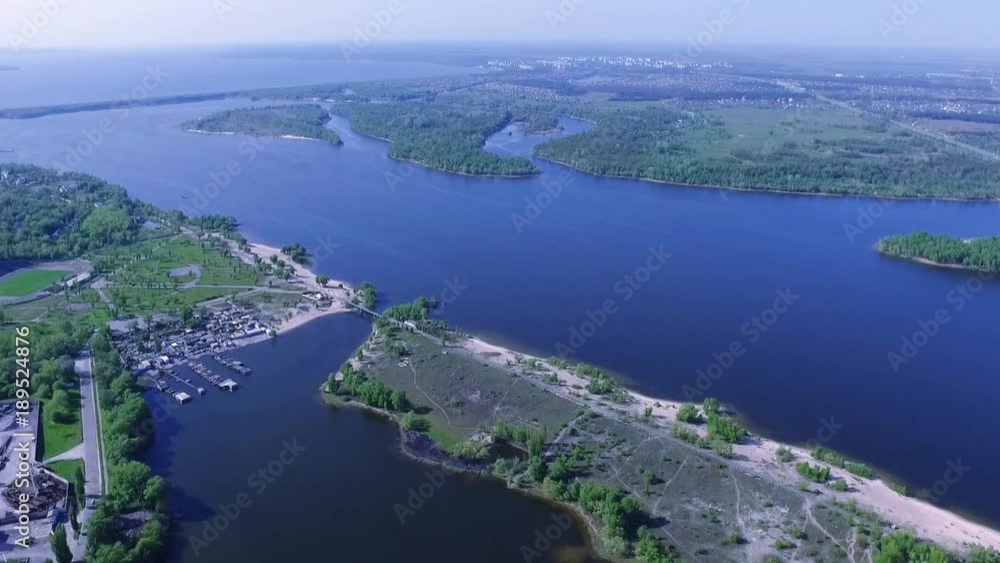 Aerial view of the bridge over the Dnipro River with islands Aerial view of the bridge over the Dnipro River with islands