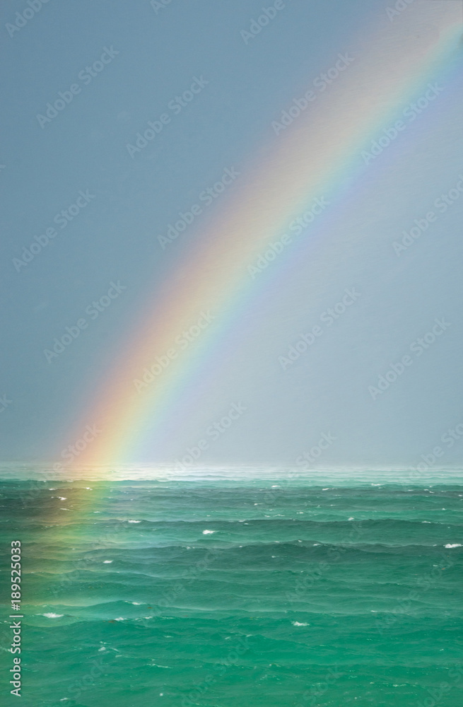 Rainbow over the ocean. Rainbow over the ocean.