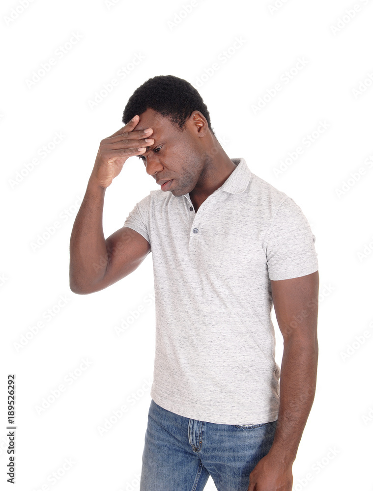 Depressed looking African man standing Depressed looking African man standing