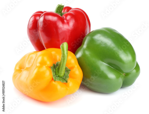 green, red, yellow sweet bell peppers isolated on white background © Dmytro