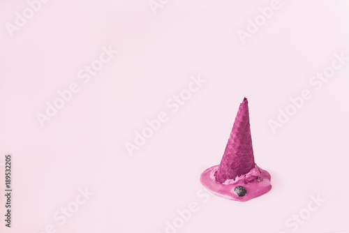 fallen pink ice cream on a light background. abstract image