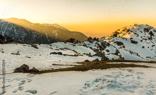 Amazing & Beautiful sunrise at Triund hill top at Mcleodganj, Dharamsala, Himachal pradesh, India. One of the most beautiful trekking places in Dharamshala. Serene place for camping and star gazing © VIVEK