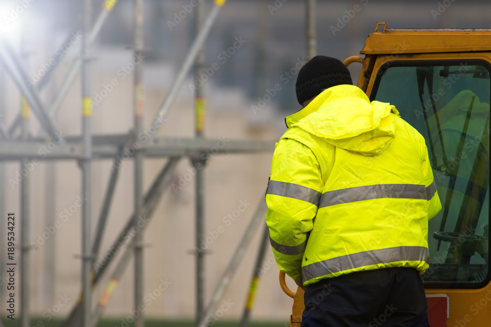 Forklift driver at the construction site Forklift driver at the construction site