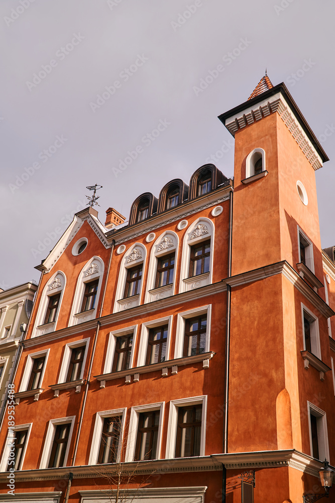 Fototapeta premium facade of the townhouse with tower in Poznan.