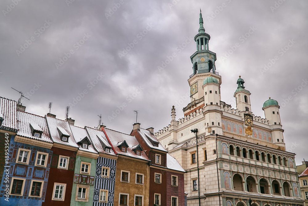 Old market with Renaissance town hall tower in winter in Poznan.