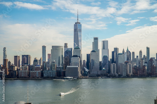 Manhattan at the day  with some clouds