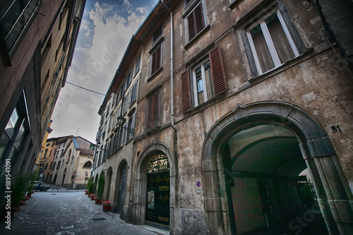 Antique streets in the city of Bergamo, Lombardy, Italy photo