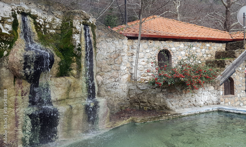 Fototapeta premium Waterfall and pool at Loutra Pozar