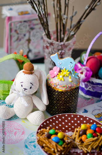 Easter's cake, eggs, candies and rabbit