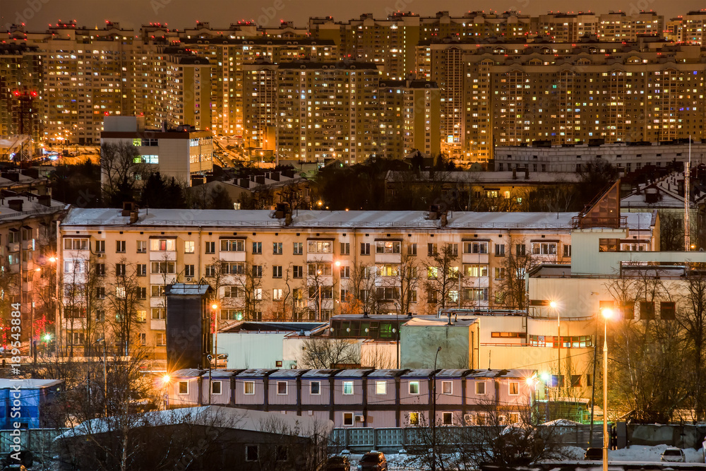 Night scenic view on Moscow district. Houses and buildings