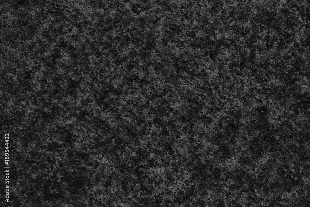 Fototapeta premium Granite rock closeup background, stone texture, cracked surface