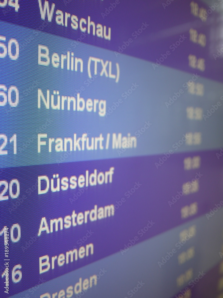 Obraz premium display which shows departures of planes on airport