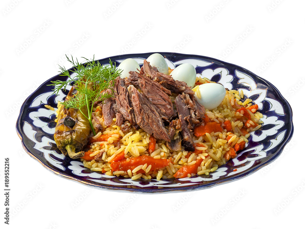 Fototapeta premium Pilau with eggs and vegetables. Traditional Uzbek cuisine, Middle East, Asia.