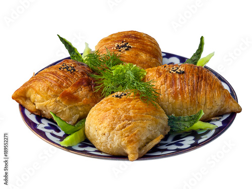 Samosa with meat. Traditional Uzbek cuisine, Middle East, Asia. photo