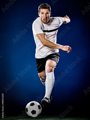 one caucasian soccer player man isolated on black background