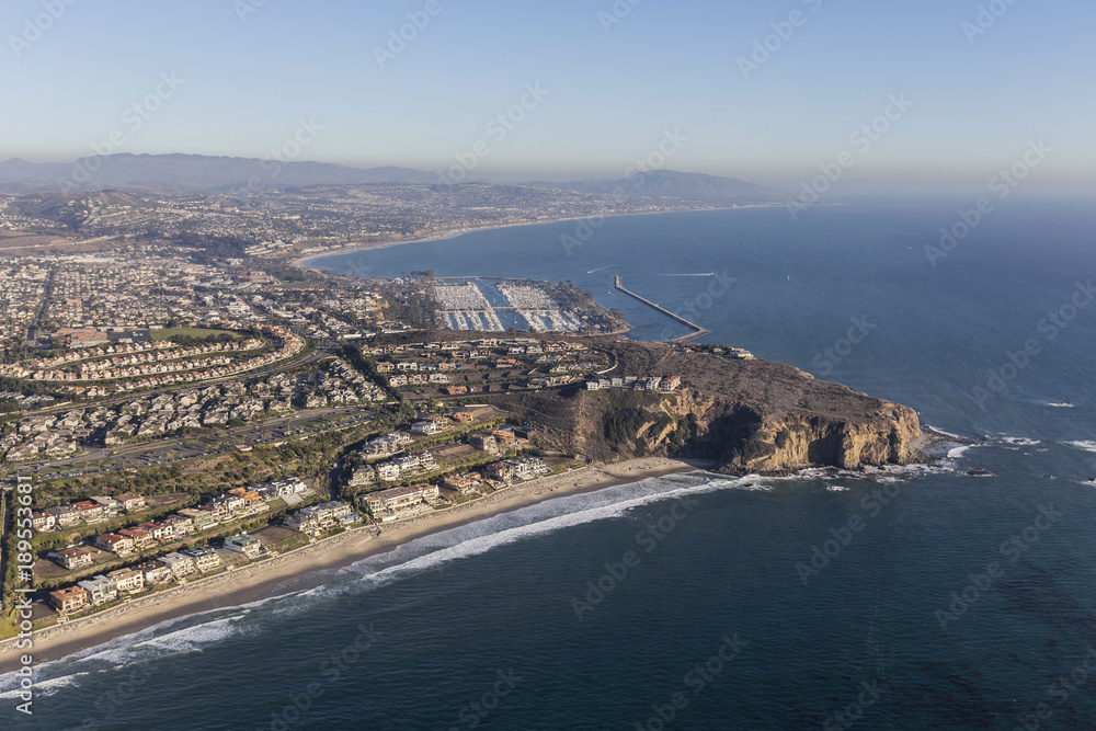 Fototapeta premium Aerial view of Dana Point shoreline and homes in Orange County California.