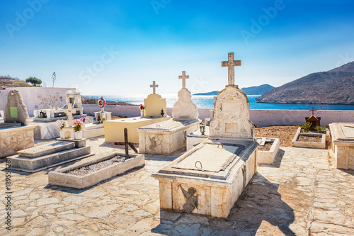 Fototapeta Naklejka Na Ścianę i Meble -  Orthodox cemetery near Pontamos beach on island of Halki (Greece)