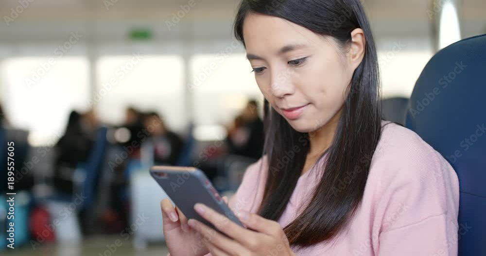Woman use of mobile phone on ferry qWoman use of mobile phone on ferry Woman use of mobile phone on ferry qWoman use of mobile phone on ferry