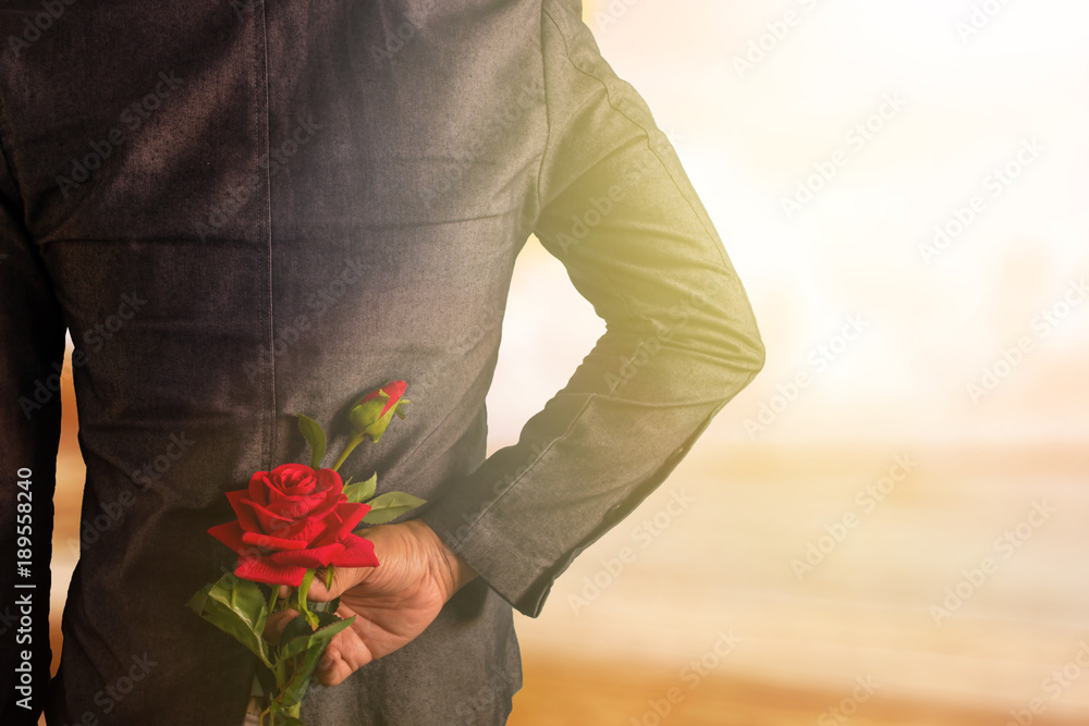 man surprise with red rose man surprise with red rose