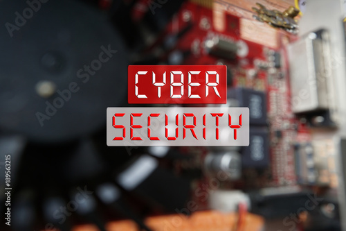 CYBER SECURITY CONCEPT : Blurred of a circuit board with big microchip .