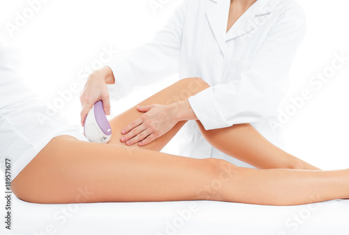 Laser Depilation. Woman on laser hair removal treatments thighs and bikini area