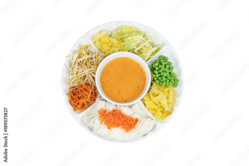 Rice noodle topped minced dried shrimp served with fish curry in coconut milk and herb. Rice noodle topped minced dried shrimp served with fish curry in coconut milk and herb.