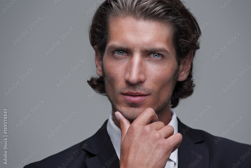 face of confident young businessman face of confident young businessman