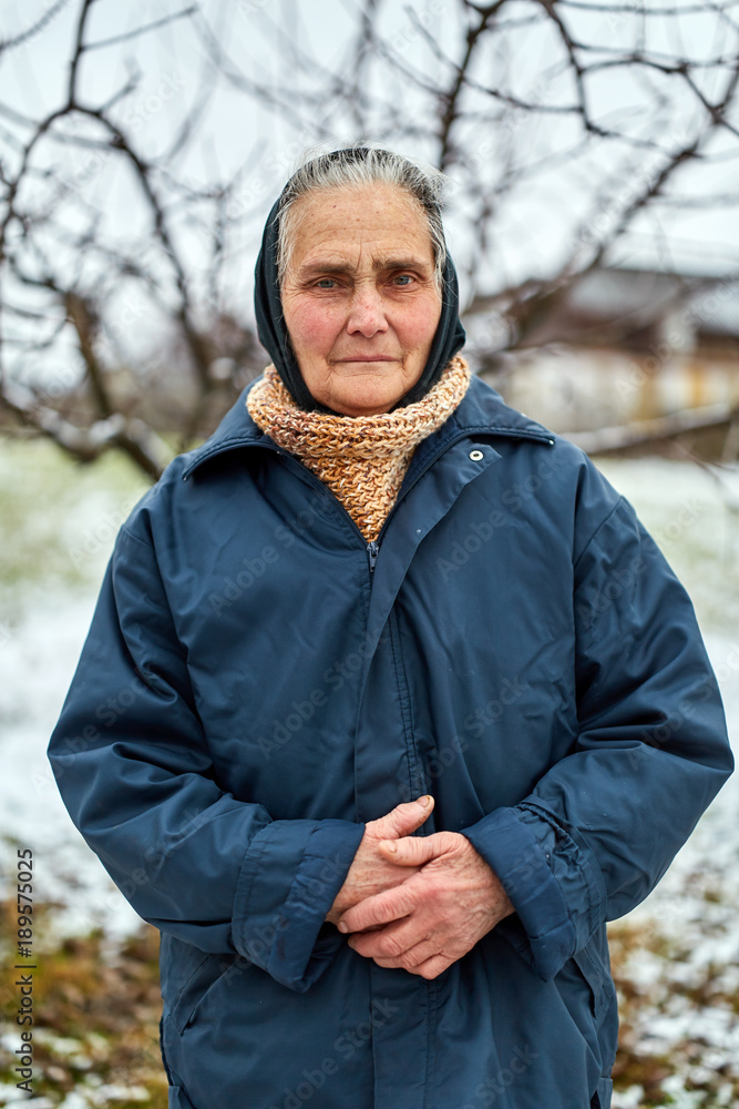 Old woman in the countryside Old woman in the countryside