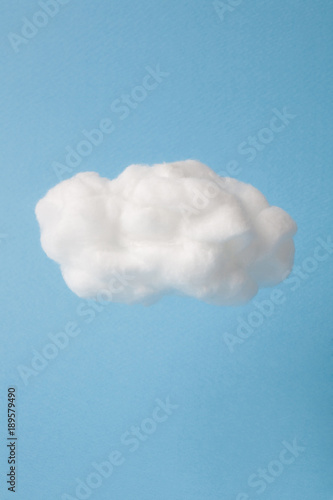 Fototapeta Naklejka Na Ścianę i Meble -  cloud made out of cotton wool on sky blue background