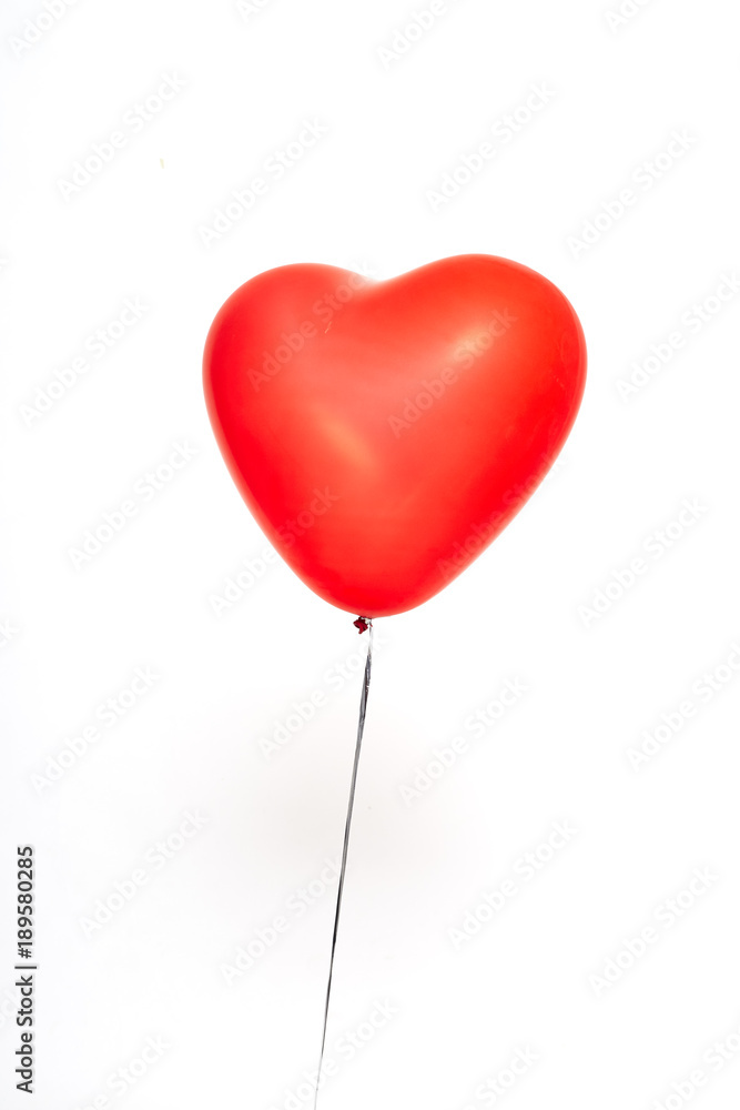 red heart balloons on a white