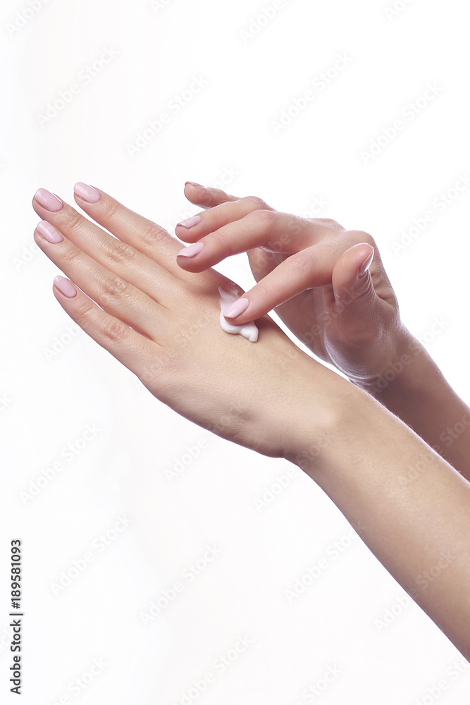 Beautiful woman's hands with white cosmetic care cream Beautiful woman's hands with white cosmetic care cream