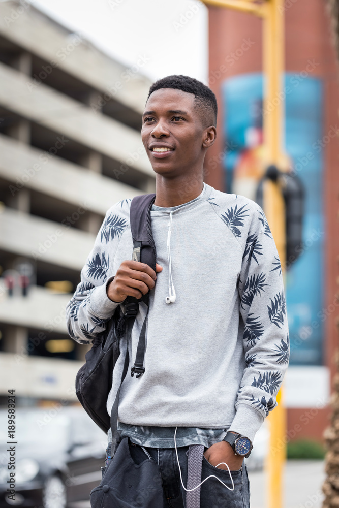 African male student . A African student on way to university. African male student . A African student on way to university.