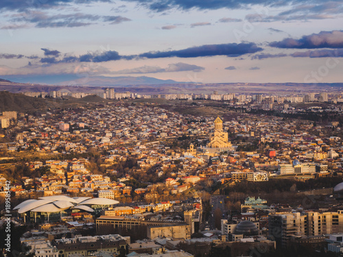 aerial view of city in Georgia and sky at sunset