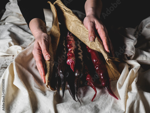 cropped shot of woman holding traditional geoogian desserts churchchel photo