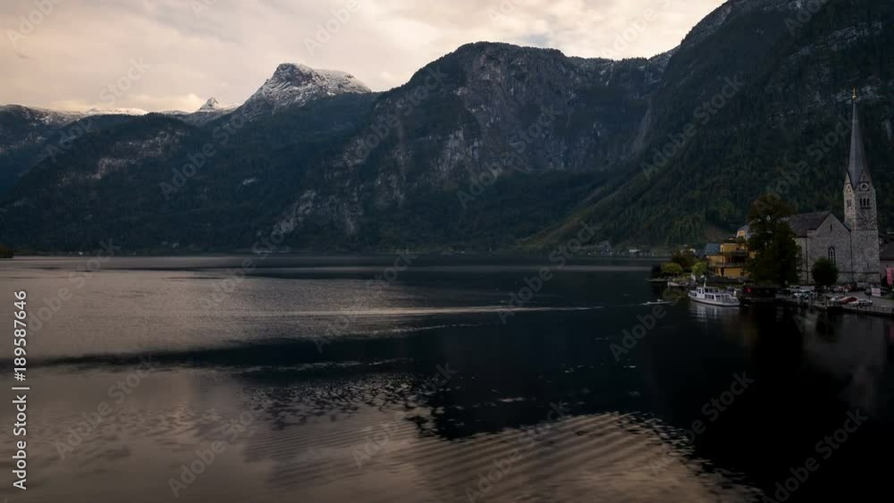 Time lapse at sunset overlooking Hallstätter See, panning towards the village of Hallstatt in Austria. Time lapse at sunset overlooking Hallstätter See, panning towards the village of Hallstatt in Austria.