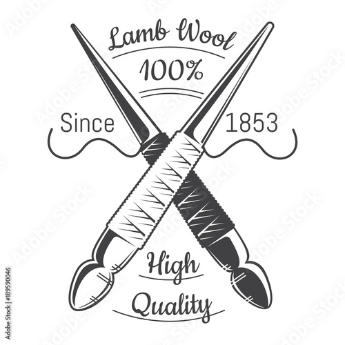 Two crossed spindle white and black with yarn. Logo for craft related site or business