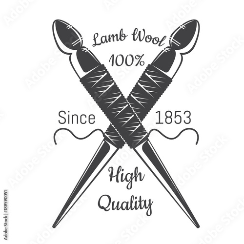 Two crossed spindle with yarn. Logo for craft related site or business