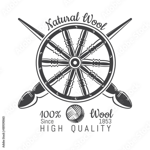 Wheel distaff with crossed spindle with yarn. Logo for craft related site or business