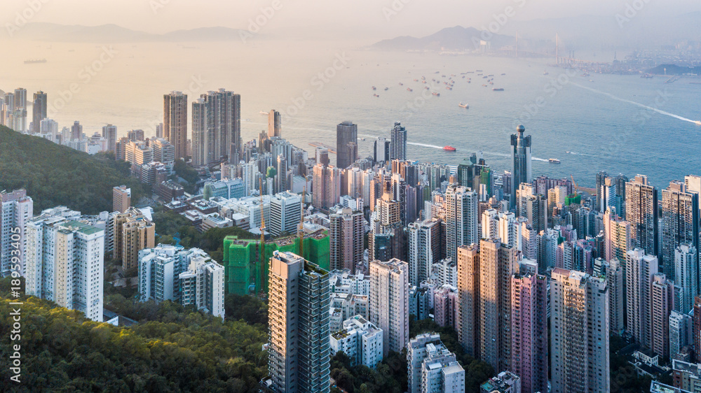 Aerial view shot from drone Victoria Harbour view from Victoria Peak, Hong Kong skyline cityscape, Victoria Peak, Hong Kong, China.